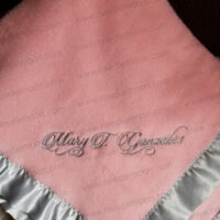 Custom embroidery on a blanket
